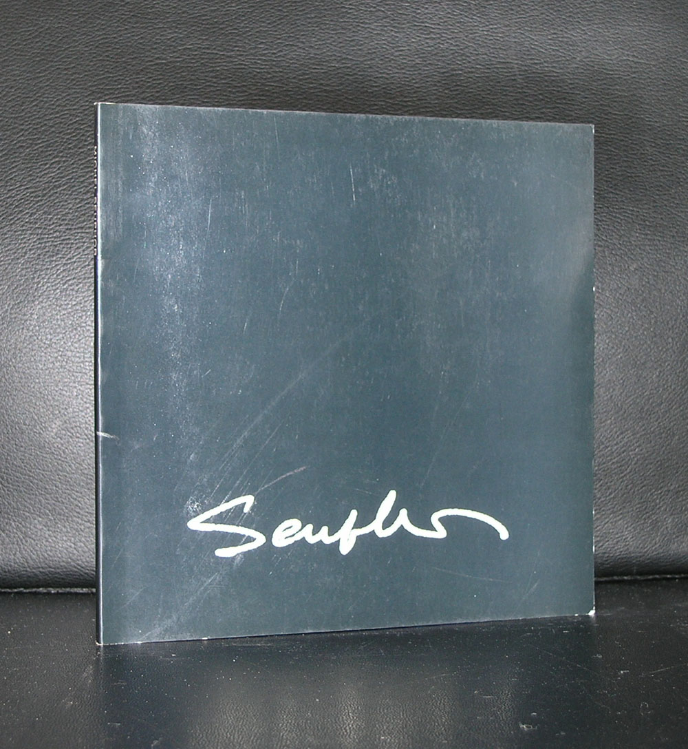 Cover of a publication by artist Michel Seuphor featuring his signature.