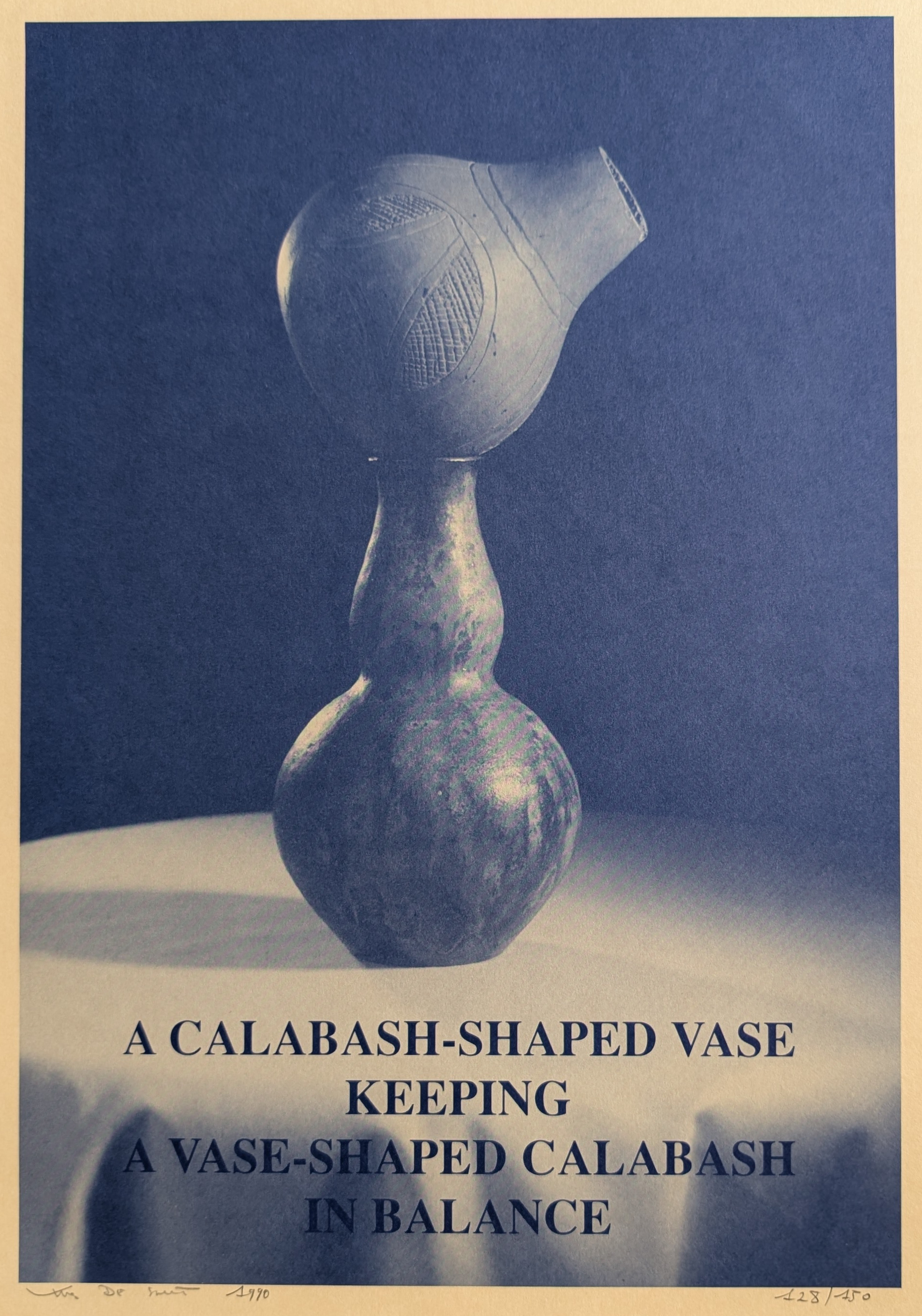 A calabash-shaped vase balancing a vase-shaped calabash, displayed against a dark background with text describing the piece.
