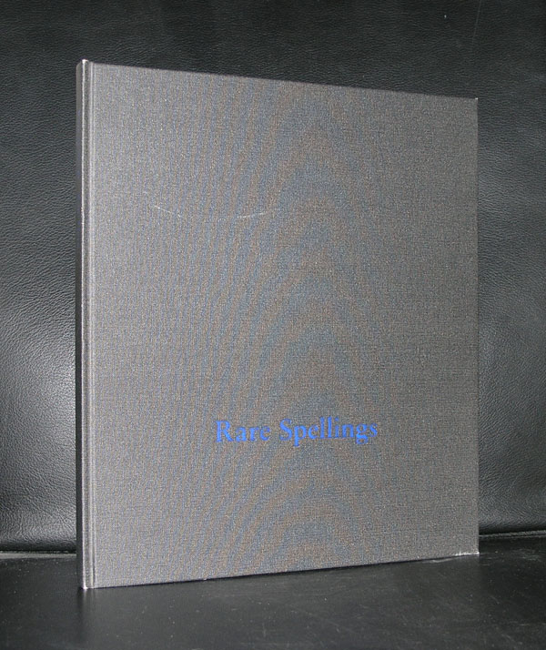 A black book with the title 'Rare Spellings' in blue text on the cover.