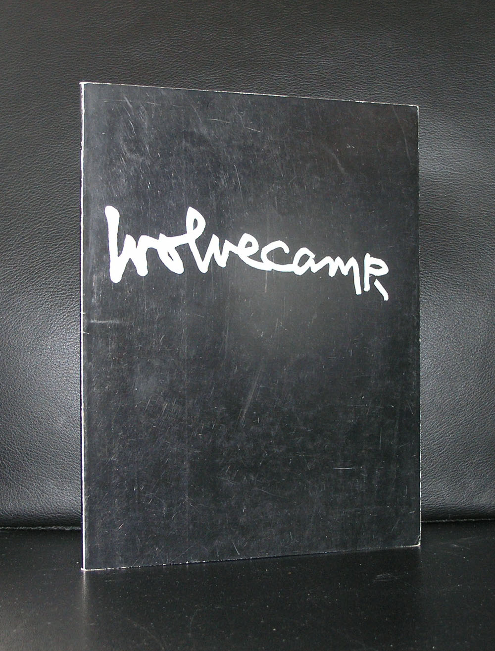 Cover of a publication featuring the name 'Wolvecamp' in white handwritten-style font against a black background.